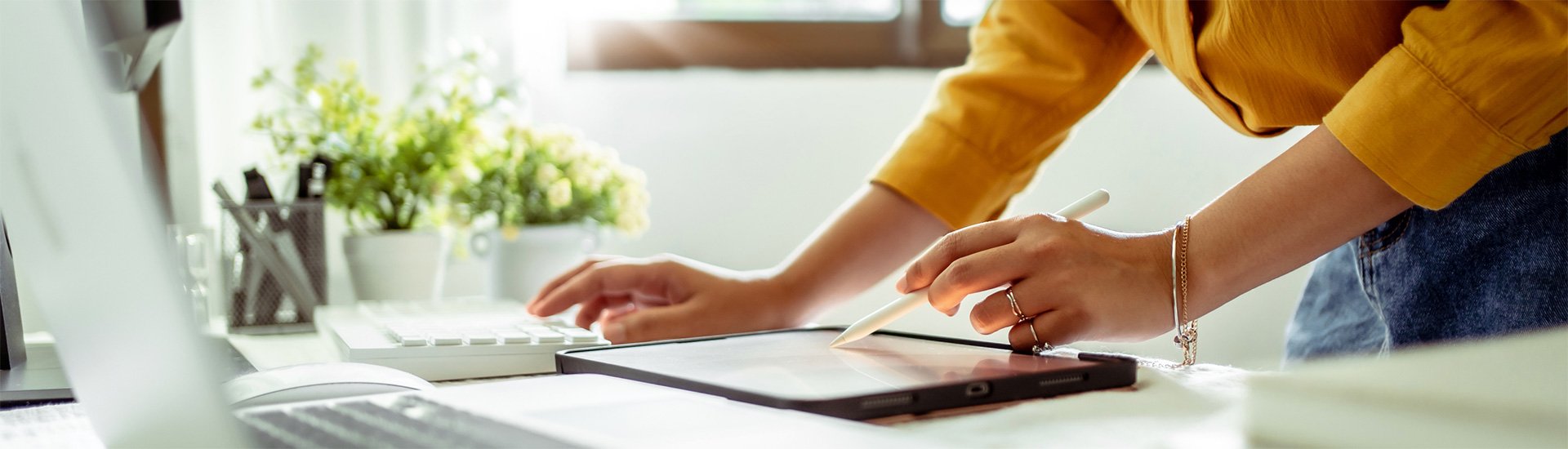 Person Accessing Data on Laptop
